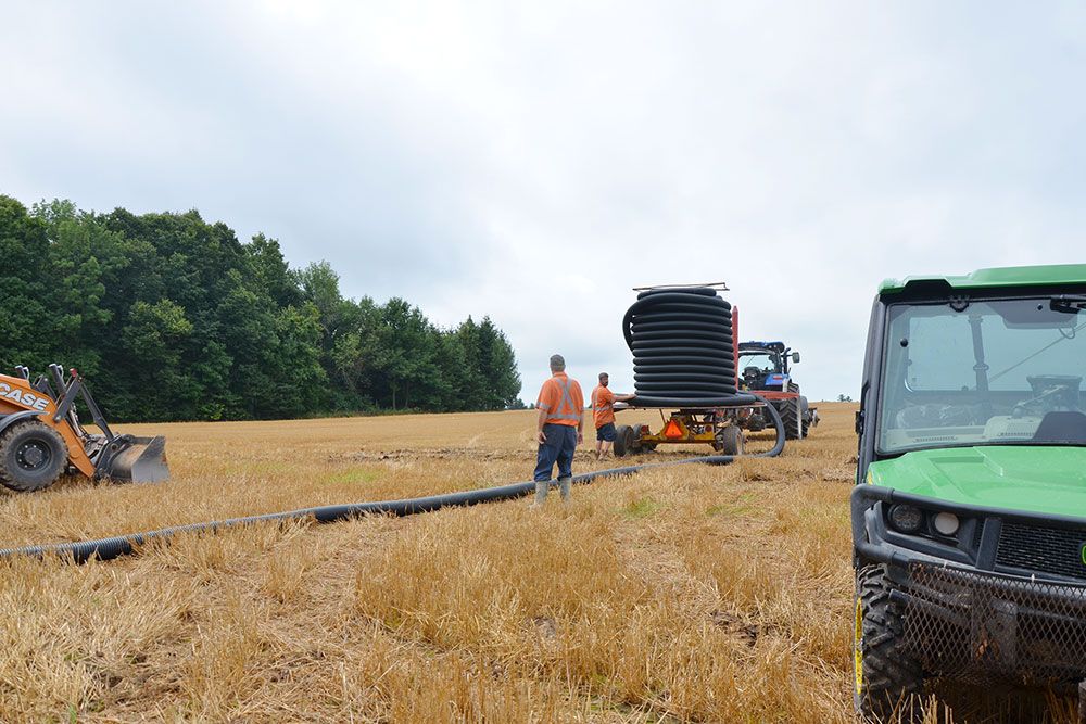 A photo of work in the fields at Huronview Demo Farm.