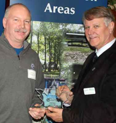 Doug Rogers received a Conservation Award from St. Clair Region Conservation Authority Chair Steve Arnold at the SCRCA Annual Meeting in February 2016 for his efforts that support a Healthy Lake Huron.